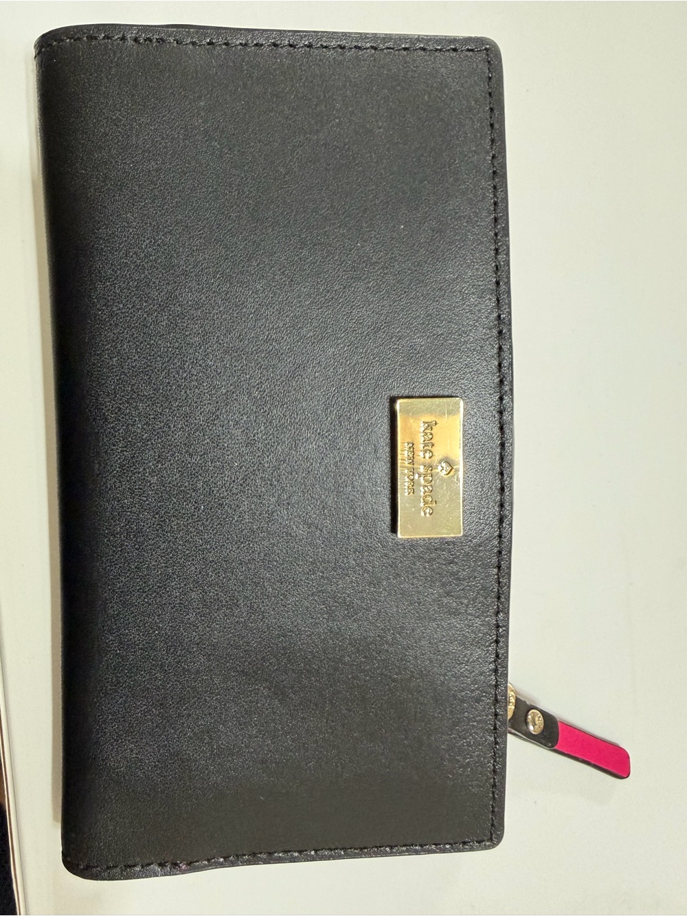 kate spade Black Leather Wallet with Pink Zip Tab and Gold Plaque